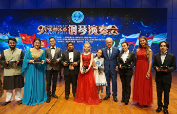 上合组织音乐彩虹点亮北京之夜。“9个美妙乐章”音乐会在中国国家大剧院隆重举行 上合组织音乐彩虹点亮北京之夜。“9个美妙乐章”音乐会在中国国家大剧院隆重举行