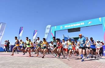 上合组织国际马拉松赛在伊塞克湖举行 上合组织国际马拉松赛在伊塞克湖举行