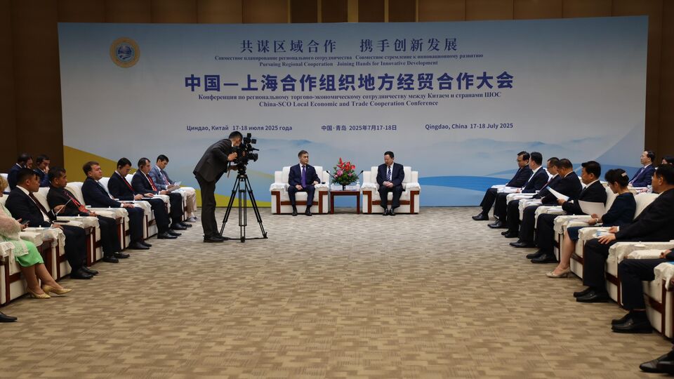 上海合作组织秘书长叶尔梅克巴耶夫会见中国山东省省长周乃翔